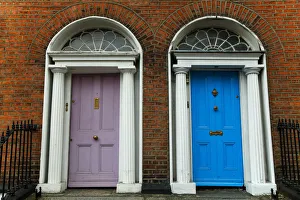 Georgian architecture and painted house doors with red brick facade in Dublin city centre Georgian architecture and painted house doors with red brick facade in Dublin city centre