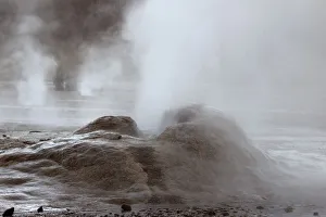 Geyser, vent releasing steam, El Tatio, the highest geyser field in the world Geyser, vent releasing steam, El Tatio, the highest geyser field in the world