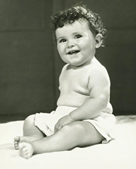 Girl (6-9 months) sitting on blanket, (B&W) Girl (6-9 months) sitting on blanket, (B&W)