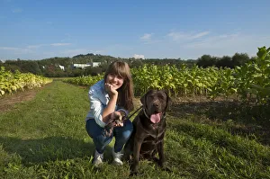Girl with her Labrador, Ringsheim, Baden-Wurttemberg, Germany Girl with her Labrador, Ringsheim, Baden-Wurttemberg, Germany