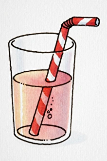 Glass tumbler of red juice with striped drinking straw Glass tumbler of red juice with striped drinking straw