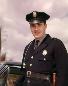 Smiling Policeman in Uniform Print (circa 1960s)
