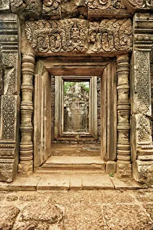 <b class=qtipBold><figcaption>Golden doorway at Bayon Temple</figcaption></b><br>Ancient carved doorway with majestic duplicate effect showing multiple open doorways to shrine at rear.<br><em>© Copyright Sharon Lapkin</em> Golden doorway at Bayon Temple
