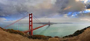 Golden Gate Bridge at sunset with storm clouds, San Francisco, California, United States Golden Gate Bridge at sunset with storm clouds, San Francisco, California, United States