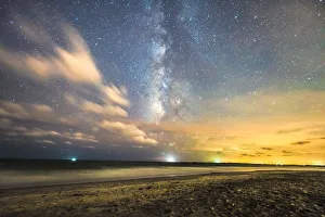 <b class=qtipBold><figcaption>Good morning Sunshine</figcaption></b><br>The milky way and sun rising at Folly Beach with some interesting clouds.<br><em>© ROBERT LOE</em> Good morning Sunshine