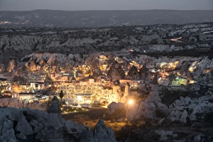 Goreme, View of cliff dwelling and village at nigh Goreme, View of cliff dwelling and village at nigh