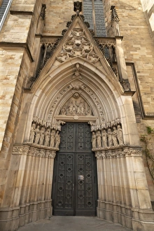 Gothic side entrance, St Marys Church, 14th-15th century, Osnabruck, Lower Saxony, Germany Gothic side entrance, St Marys Church, 14th-15th century, Osnabruck, Lower Saxony, Germany