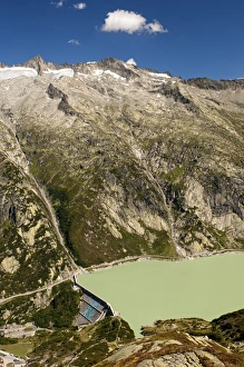 Gravity dam damming the Aare River at Raeterichsbodensee Lake, Guttannen, Bernese Oberland, Switzerland, Europe Gravity dam damming the Aare River at Raeterichsbodensee Lake, Guttannen, Bernese Oberland, Switzerland, Europe