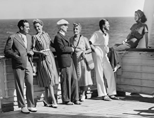 Group of people standing on cruiser deck (B&W) Group of people standing on cruiser deck (B&W)