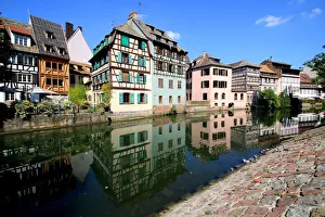 Half-timbered houses reflected in the Ill river, La Petite France quarter, Strasbourg Half-timbered houses reflected in the Ill river, La Petite France quarter, Strasbourg