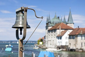 Harbour bell, port of Steckborn with Schloss Steckborn castle at back, Lake Constance, Switzerland, Europe Harbour bell, port of Steckborn with Schloss Steckborn castle at back, Lake Constance, Switzerland, Europe