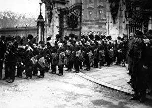 <b class=qtipBold><figcaption>Hats Off For King</figcaption></b><br>circa 1928: Boys from Newport Army Training School at Buckingham Palace cheering the King during the State opening of parliament. (Photo by London Express/Getty Images) Hats Off For King