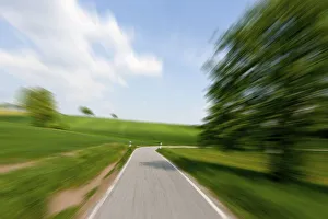 High speed motion, country road approaching a curve, Schoenbrunn, Baden-Wuerttemberg High speed motion, country road approaching a curve, Schoenbrunn, Baden-Wuerttemberg