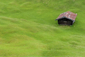 Hilly meadow with hay barn at Mt. Kranzberg, Karwendelgebirge mountains, Mittenwald Hilly meadow with hay barn at Mt. Kranzberg, Karwendelgebirge mountains, Mittenwald