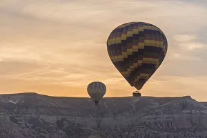 Hot air balloon flying sunset, Cappadocia, Turkey Hot air balloon flying sunset, Cappadocia, Turkey