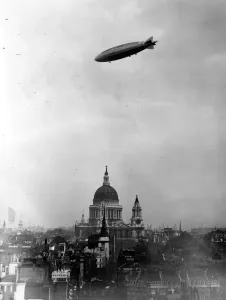 Prints of October 1929: Airship R101 passing over St Pauls Cathedral, London. (Photo by Topical Press Agency/Getty Images) Aviation Prints: Airship R-101 Print: Vintage Photograph of Airship Over St Paul's Cathedral