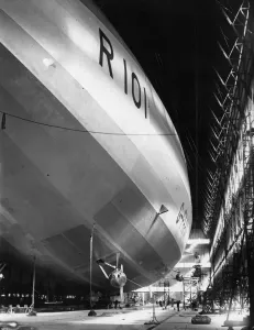 Prints of 2nd October 1929: An R101 Airship in its hangar at Cardington, Bedfordshire. (Photo by Puttnam /Topical Press Agency/Getty Images) Bedfordshire Prints: R101 Airship Print: A large airship in a hangar