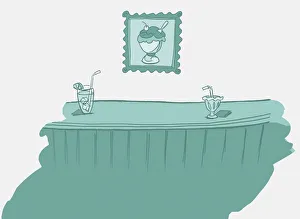Ice cream bowl and drink on bar counter, framed picture of ice cream on wall behind Ice cream bowl and drink on bar counter, framed picture of ice cream on wall behind