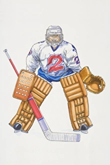 Ice hockey goalkeeper standing poised with legs apart, holding stick Ice hockey goalkeeper standing poised with legs apart, holding stick