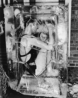 <b class=qtipBold><figcaption>Ice Magic</figcaption></b><br>An escape artist encased in a block of ice, circa 1930. (Photo by FPG/Hulton Archive/Getty Images)<br><em>© 2004 Getty Images</em> Ice Magic