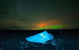 Related Images Gallery: Iceberg under Aurora borealis at Jokulsarlon, Iceland