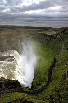 <b class=qtipBold><figcaption>Icelandic Gullfoss waterfall canyon</figcaption></b><br>Canyon of Hvita river and famous Golden waterfall in south west Iceland surrounded by barren landscape covered in moss.<br><em>© copyright 2015 mariusz kluzniak</em> Icelandic Gullfoss waterfall canyon