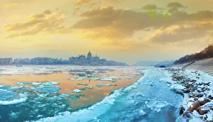 The icy Danube river and the Parliament of Hungary in Budapest at dawn in the winter The icy Danube river and the Parliament of Hungary in Budapest at dawn in the winter