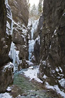 Icy gorge with a mountain stream and steep rock walls, Partnach Gorge, near Garmisch-Partenkirchen, Upper Bavaria Icy gorge with a mountain stream and steep rock walls, Partnach Gorge, near Garmisch-Partenkirchen, Upper Bavaria