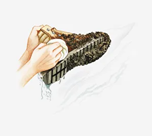 Illustration of man using wet rag to clean mud from Illustration of man using wet rag to clean mud from