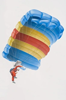 Illustration, parachutist descending, view from above Illustration, parachutist descending, view from above