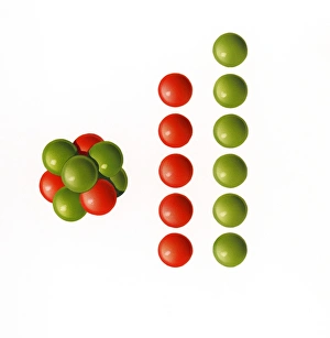 Illustration showing relative atomic mass of nucleus of boron-11 containing five protons and six neutrons Illustration showing relative atomic mass of nucleus of boron-11 containing five protons and six neutrons