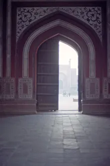 <b class=qtipBold><figcaption>India, Agra, Arch in Agra fort</figcaption></b><br>Agra Fort is a UNESCO World Heritage site located in Agra, India. The fort is also known as Lal Qila, Fort Rouge and Red Fort of Agra. It is about 2.5 km northwest of its much more famous sister monument, the Taj Mahal. The fort can be more accurately described as a walled palatial city. It is the most important fort in India. The great Mughals Babur, Humayun, Akbar, Jehangir, Shah Jahan and Aurangzeb lived here, and the country was governed from here. It contained the largest state treasury and mint. It was visited by foreign ambassadors, travellers and the highest dignitaries who participated in the making of history in India.<br><em>© This content is subject to copyright.</em> India, Agra, Arch in Agra fort