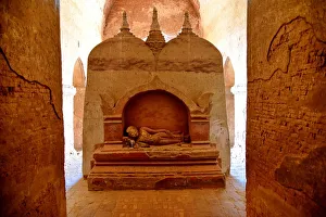 Inside Dhamma Yan Gyi with stone buddha sculpture Temple, Bagan, unesco ruins Myanmar Inside Dhamma Yan Gyi with stone buddha sculpture Temple, Bagan, unesco ruins Myanmar
