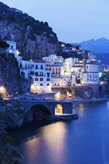 Italy, Campania, Atrani, Town on coastline at dusk Italy, Campania, Atrani, Town on coastline at dusk