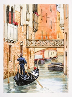 Italy, Venice, man rowing gondola in city canal, rear view Italy, Venice, man rowing gondola in city canal, rear view