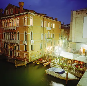 Italy, Venice, restaurants on Grand Canal at night, elevated view Italy, Venice, restaurants on Grand Canal at night, elevated view