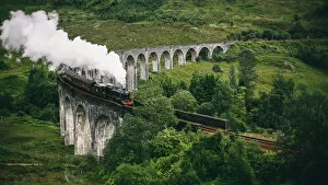 Images Dated 26th August 2015: Jacobite Express crossing Glenfinnan Viaduct
