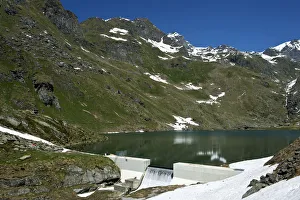 At Lac de Louvie mountain lake, Val de Bagnes valley, Canton of Valais, Switzerland At Lac de Louvie mountain lake, Val de Bagnes valley, Canton of Valais, Switzerland