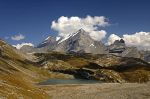 At Laemmerensee Lake, view of the peaks of Mt Atels, Mt Rinderhorn and Mt Plattenhoerner, Bernese Alps, Switzerland At Laemmerensee Lake, view of the peaks of Mt Atels, Mt Rinderhorn and Mt Plattenhoerner, Bernese Alps, Switzerland