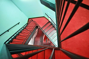 <b class=qtipBold><figcaption>land of confusion</figcaption></b><br>This image depicts an abstract and Escher-like view of the spiral staircase in Madison's Children's Museum. Image was taken with a 10mm wide angle lens facing downwards. The colors of the walls and floors were changed. No other corrections were made.<br><em>© Ralph Grunewald</em> land of confusion