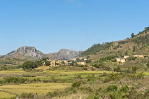 Landscape, village of the Betsileo people with terraced rice paddies, rocky mountains Landscape, village of the Betsileo people with terraced rice paddies, rocky mountains