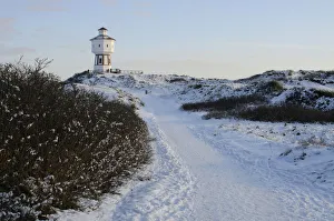 Langeoog water tower in winter, Lower Saxony, Germany, Europe Langeoog water tower in winter, Lower Saxony, Germany, Europe