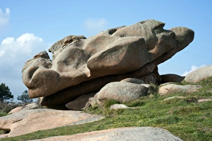 Large boulder lying diagonally on a slope, Cote de Granit Rose, Brittany, France, Europe Large boulder lying diagonally on a slope, Cote de Granit Rose, Brittany, France, Europe