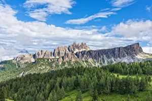 Lastoi de Formin mountain with blue sky and clouds, Croda da Lago at the back, Dolomites Lastoi de Formin mountain with blue sky and clouds, Croda da Lago at the back, Dolomites
