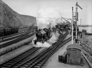 <b class=qtipBold><figcaption>Leaving Fishguard</figcaption></b><br>30th August 1909: A railway train departs from Fishguard Station. (Photo by Topical Press Agency/Getty Images) Leaving Fishguard