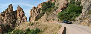 Les Calanche rock formations and coastal road Les Calanche rock formations and coastal road