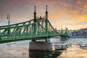The Liberty bridge in Budapest in the winter sunset The Liberty bridge in Budapest in the winter sunset