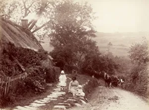 <b class=qtipBold><figcaption>Life In Whitby</figcaption></b><br>A woman and two children playing by the roadside in Whitby, circa 1880. (Photo by Frank Meadow Sutcliffe/Hulton Archive/Getty Images)<br><em>© 2003 Getty Images</em> Life In Whitby