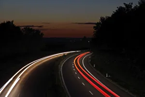 Light trails, dusk, highway, federal road B30, near Biberach, Upper Swabia, Baden-Wuerttemberg, Germany, Europe Light trails, dusk, highway, federal road B30, near Biberach, Upper Swabia, Baden-Wuerttemberg, Germany, Europe