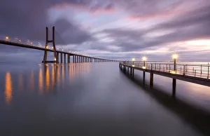 <b class=qtipBold><figcaption>Lights and Reflections</figcaption></b><br>The first day of the year and the first sunrise of the year. The Vasco da Gama bridge crosses the two banks of the Tagus river and the light and reflections bathe in the river waters.<br><em>© Copyright © 2016 SergioLuisSilva</em> Lights and Reflections